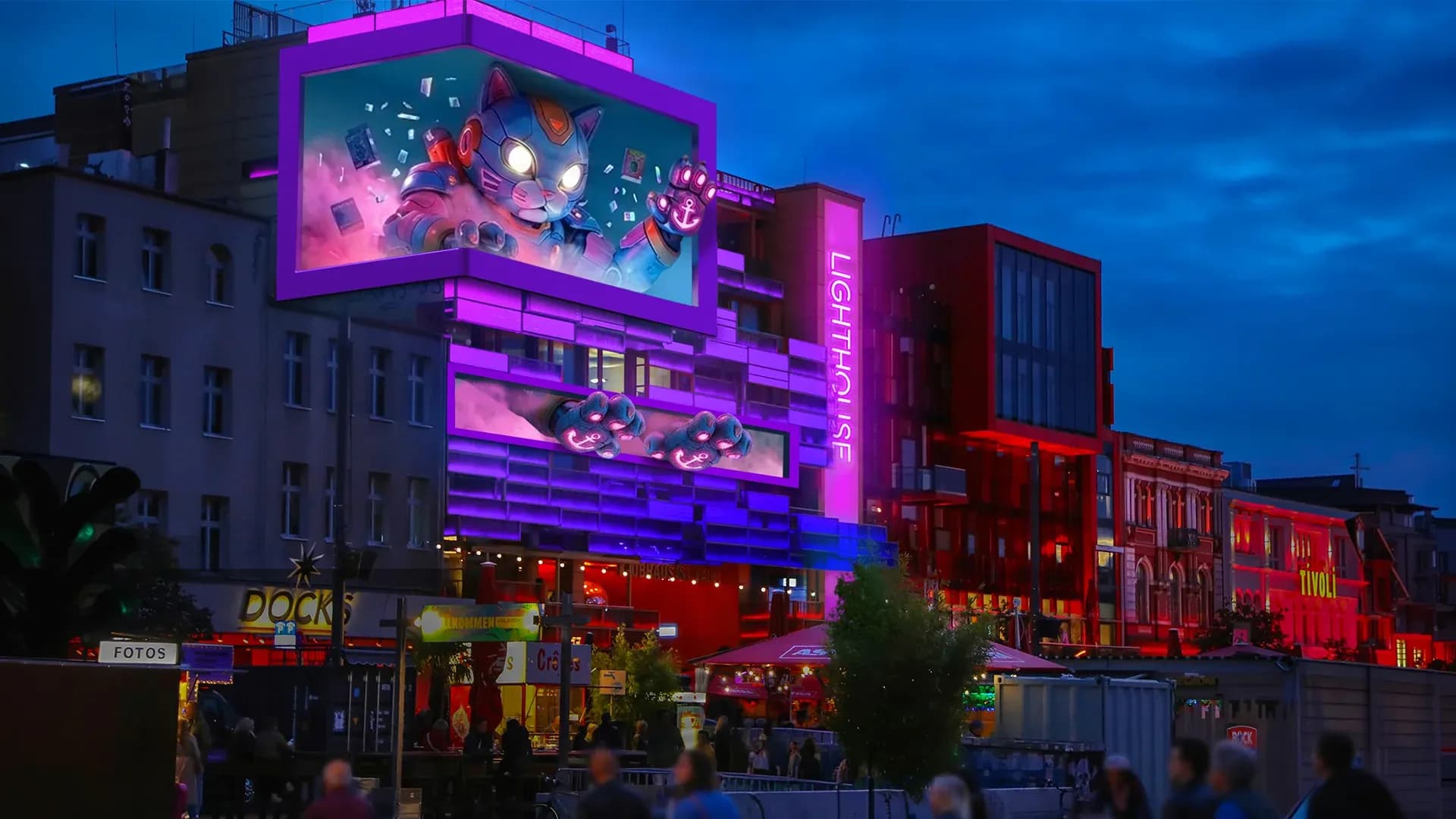 Visualisierung einer beleuchteten Gebäudefassade mit mehreren großen digitalen LED-Flächen am Hamburger Spielbudenplatz.